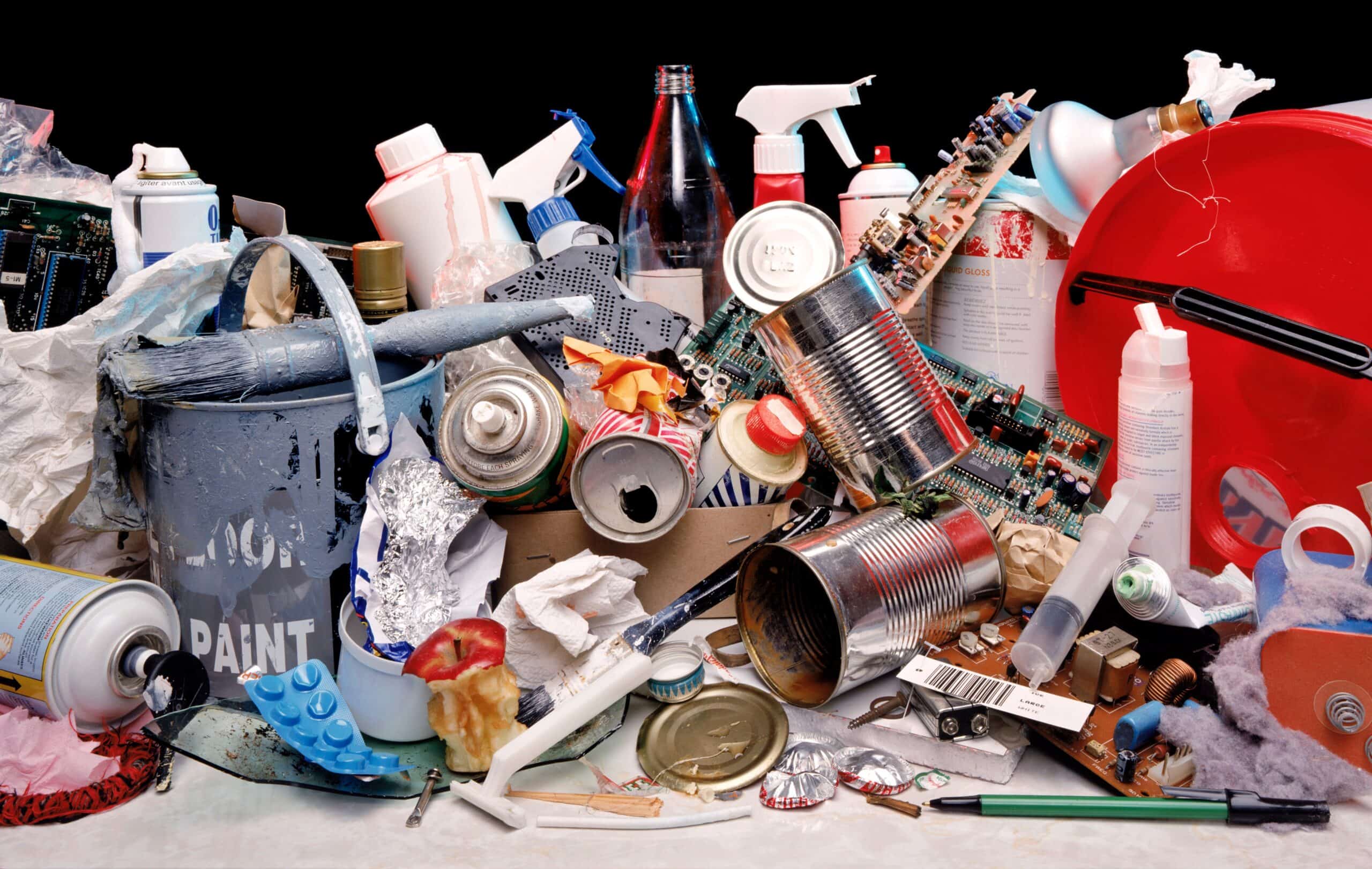Household paint and chemical containers set aside for proper disposal in the Cedar Valley.